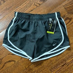 Nike Dry WOMENS shorts size Small. Gray with white stripe.